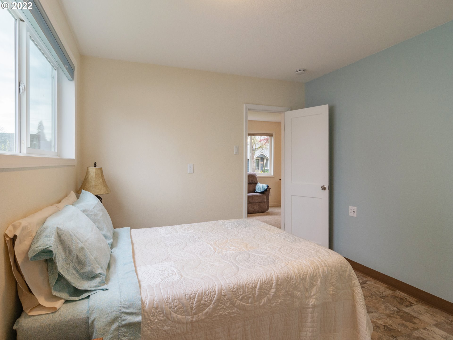 1340 E Street Springfield, OR 97477 - Photo 21 of 32 a bedroom with a bed and window