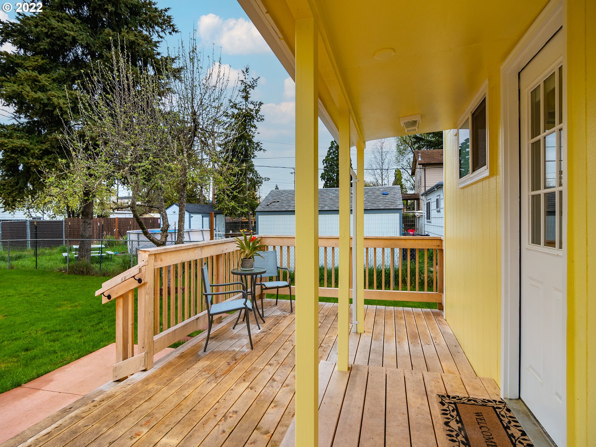 1340 E Street Springfield, OR 97477 - Photo 3 of 32 a view of a balcony with two chairs and a table