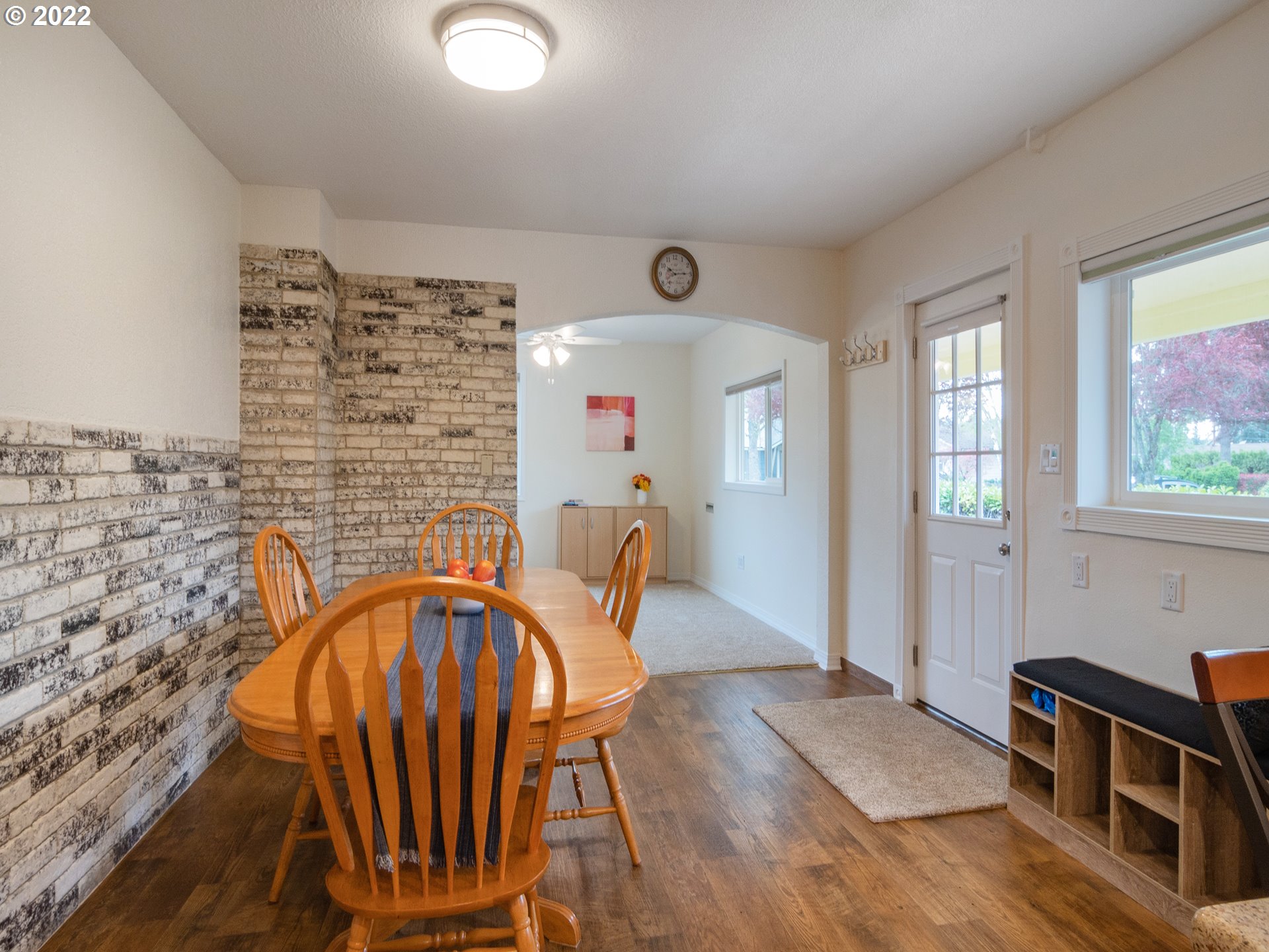 1340 E Street Springfield, OR 97477 - Photo 6 of 32 a view of a dining room with furniture and wooden floor