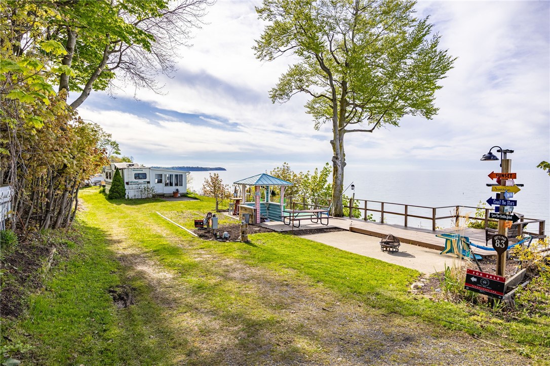 7945 Lake Road, Unit 83 Sodus, NY 14555 - Photo 1 of 22 Slice of Heaven awaits with miles of Lake Ontario