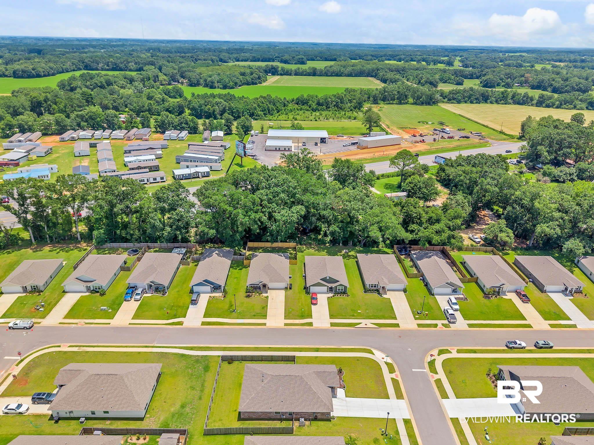 17217 REFLECTION Street Loxley, AL 36551 - Photo 78 of 83 Aerial perspective of suburban area
