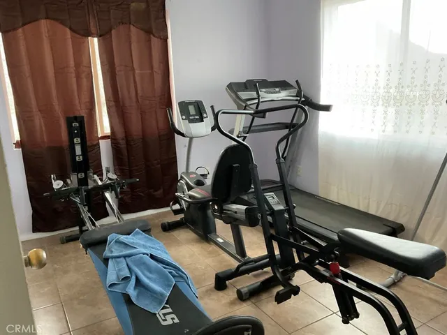 a view of a room with gym equipment