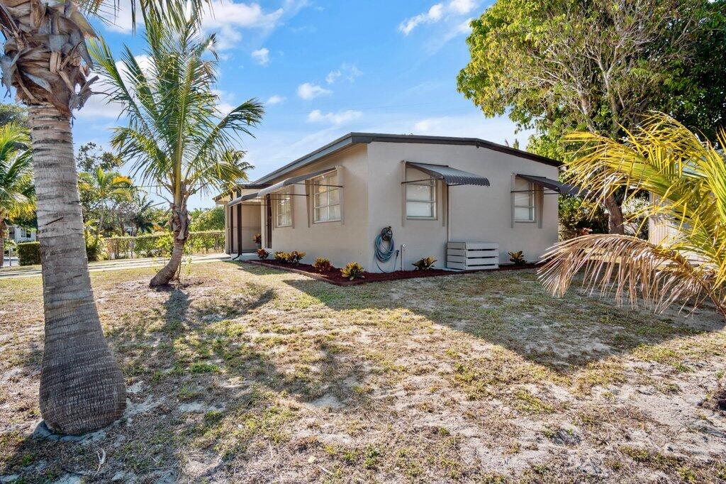 591 Oleander Road Lake Worth, FL 33462 - Photo 26 of 43 Front Exterior R close.jpg-SMALL