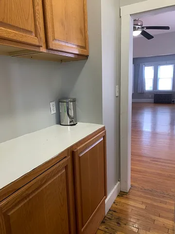 a kitchen with stainless steel appliances a refrigerator and cabinets