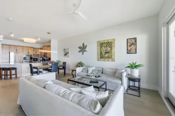 a living room with furniture and a table