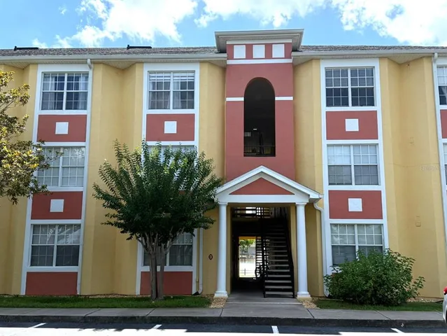 a front view of a multi story residential apartment building