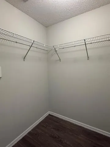 a view of a room with racks on the wall