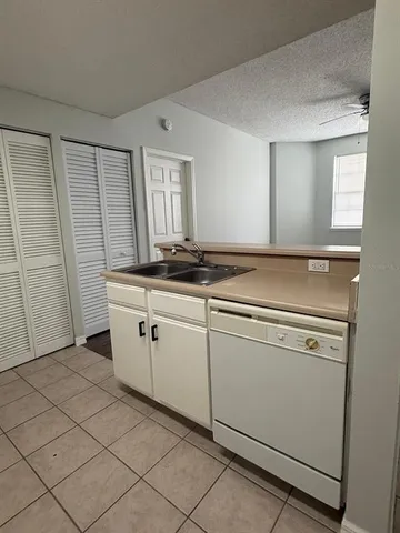 a utility room with washer and dryer