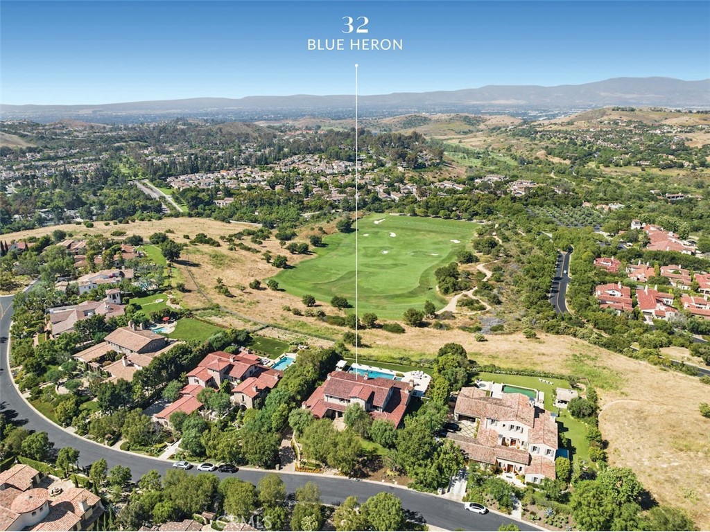 32 Blue Heron Irvine, CA 92603 - Photo 1 of 1 an aerial view of residential houses with outdoor space