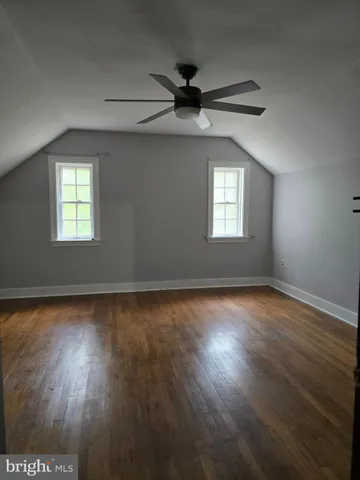 a bathroom with a shower and a toilet