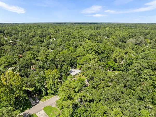 a view of a yard with an outdoor space