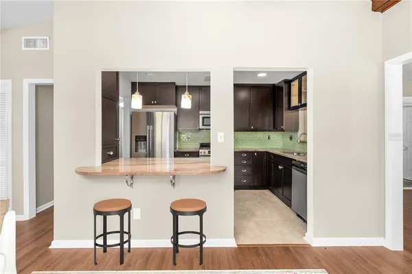 a view of living room with furniture and window