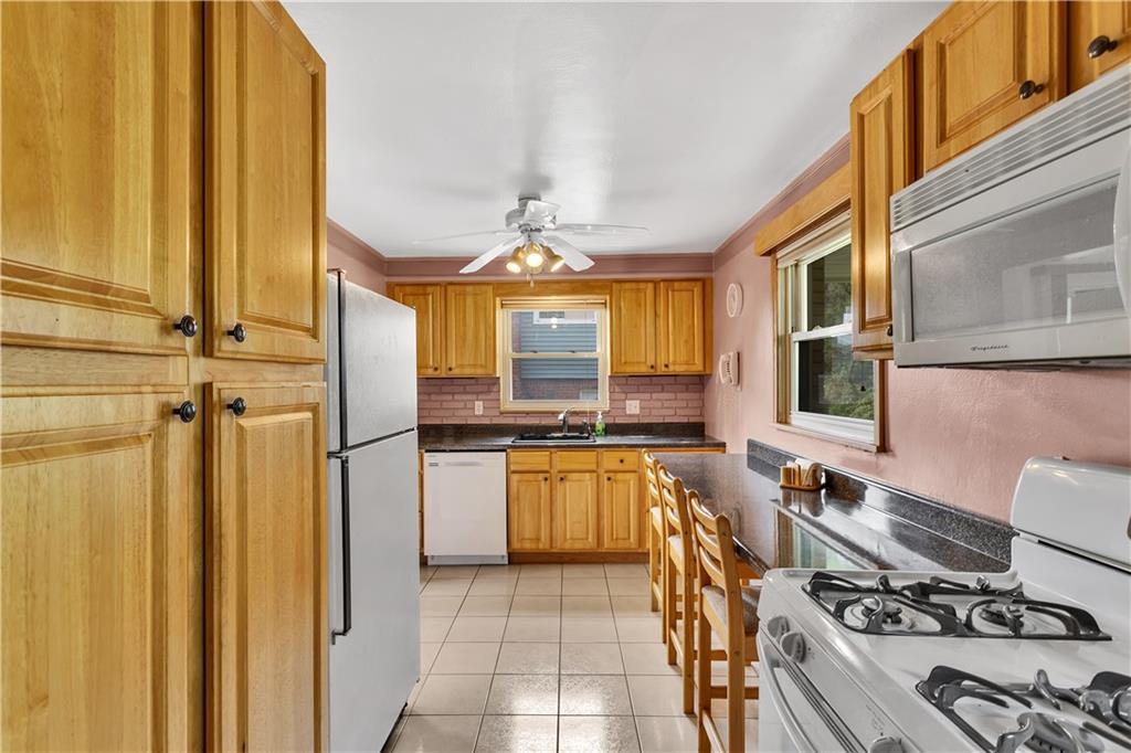 2335 Monroeville Road Monroeville, PA 15146 - Photo 20 of 33 Everything You Need - Plus a Built in Breakfast Bar with Matching Chairs.