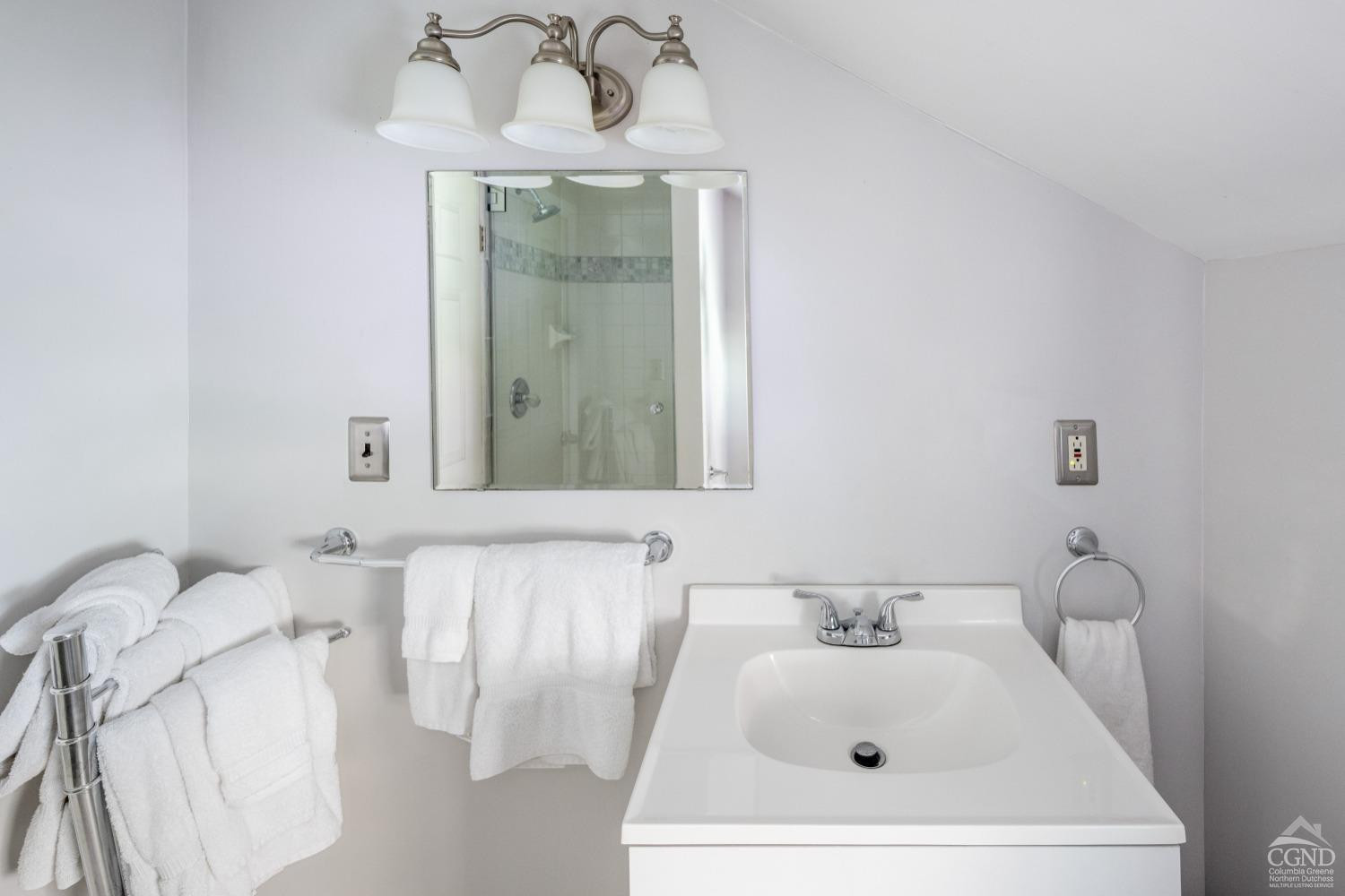 98 Goetz Road East Chatham, NY 12060 - Photo 16 of 28 a bathroom with a sink and a mirror