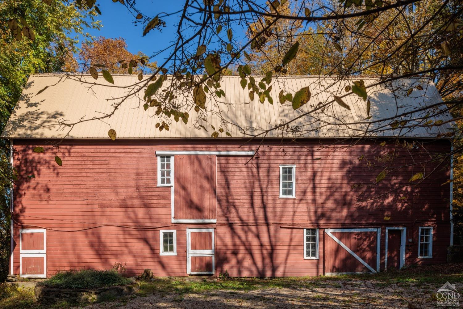 98 Goetz Road East Chatham, NY 12060 - Photo 19 of 28 a view of a brick house with a large tree