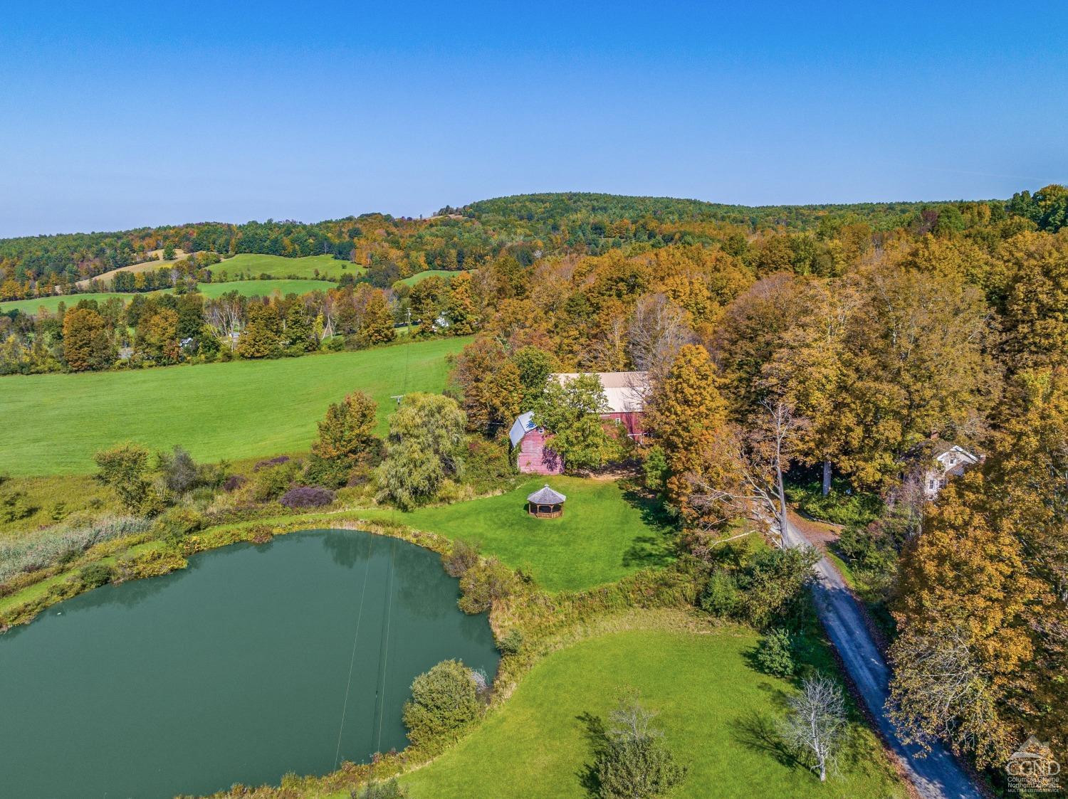 98 Goetz Road East Chatham, NY 12060 - Photo 26 of 28 a view of a lake with a mountain in the background