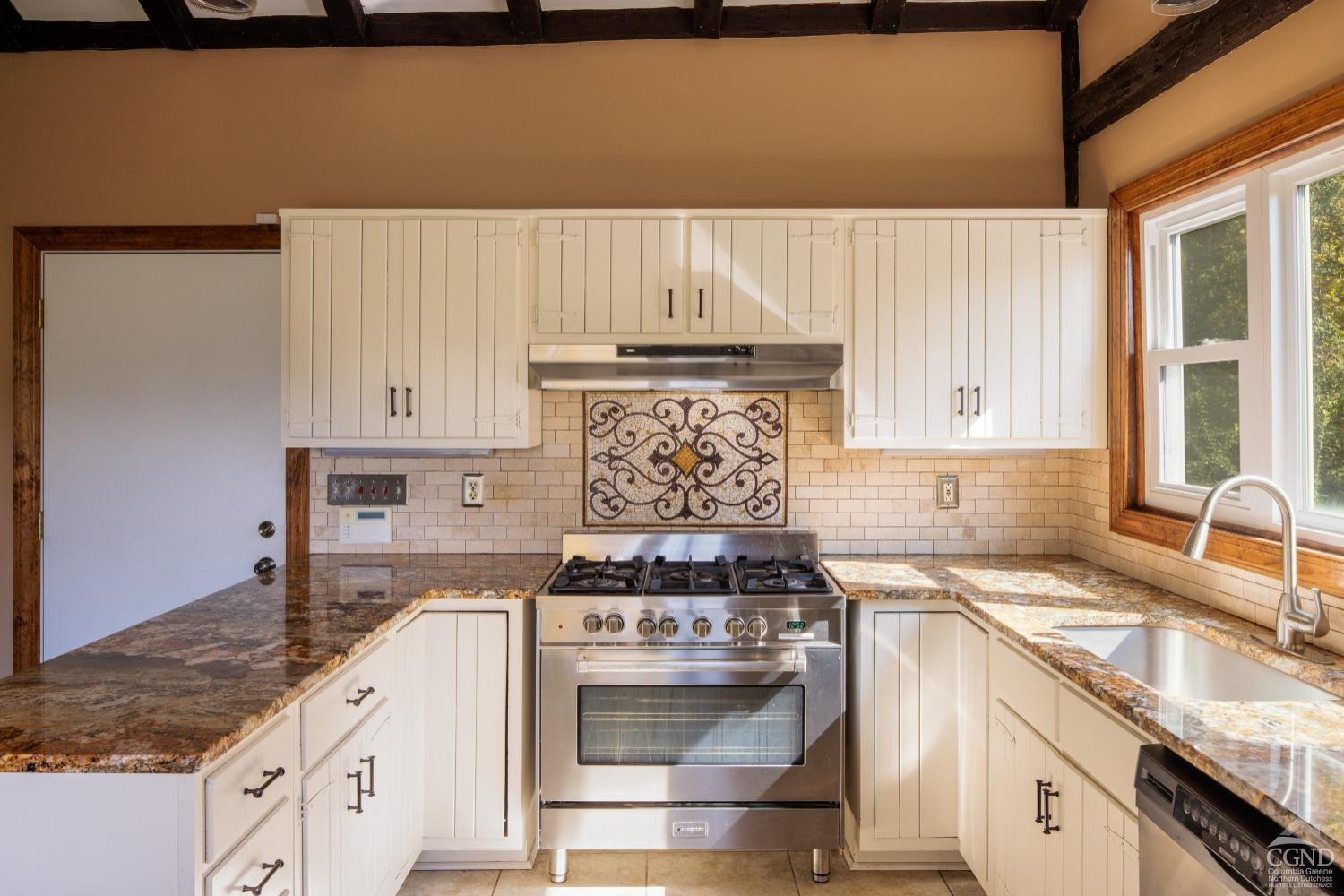 98 Goetz Road East Chatham, NY 12060 - Photo 5 of 28 a kitchen with granite countertop a sink stove and cabinets