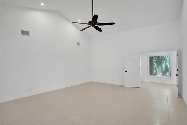 a view of a room that has a large window