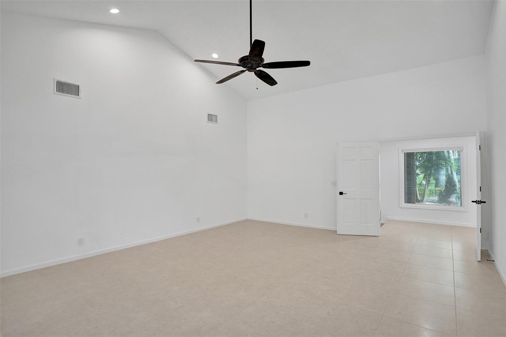 2891 Northwest 28th Terrace Boca Raton, FL 33434 - Photo 24 of 51 a view of empty room with windows