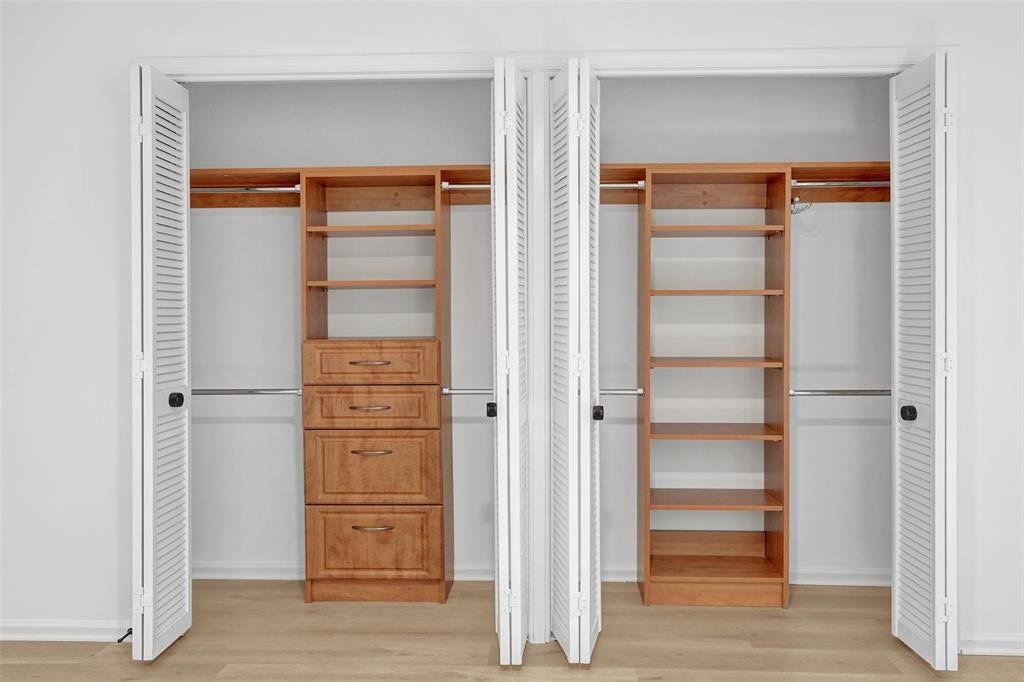 2891 Northwest 28th Terrace Boca Raton, FL 33434 - Photo 36 of 51 a view of walk in closet with empty racks