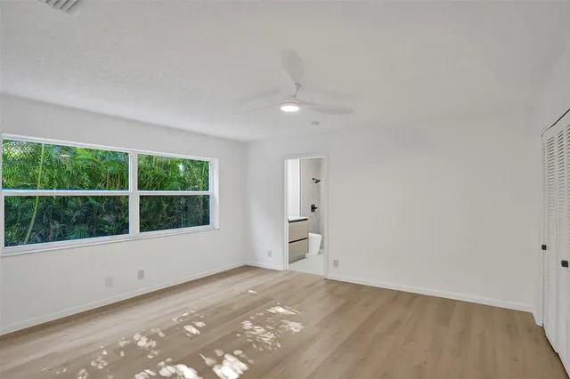wooden floor and closet in a room