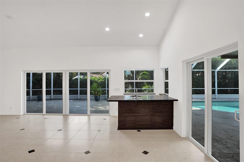 2891 Northwest 28th Terrace Boca Raton, FL 33434 - Photo 7 of 51 a living room with a large window