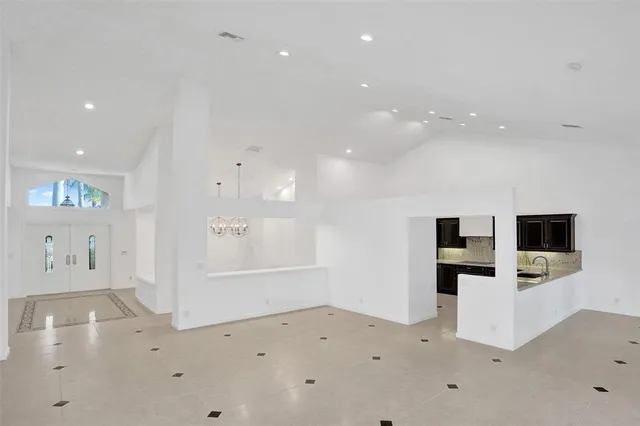 a view of kitchen with furniture and flat screen tv