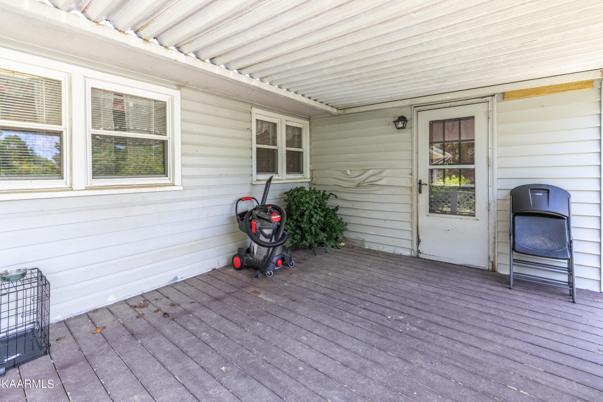 6719 Cate Road Knoxville, TN 37931 - Photo 27 of 30 a view of a wooden chairs and a table in a room