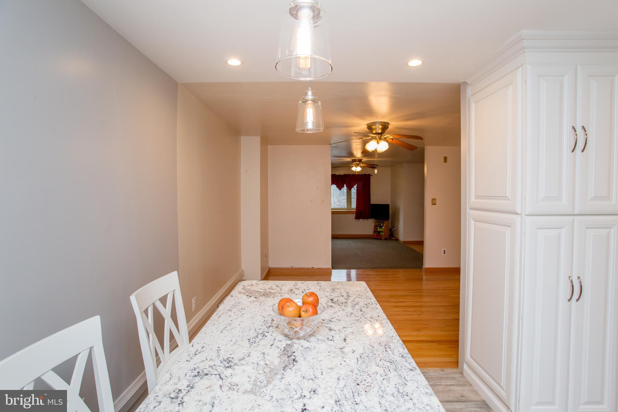 10825 Academy Road Philadelphia, PA 19154 - Photo 17 of 56 Kitchen Island with view into Dining Room