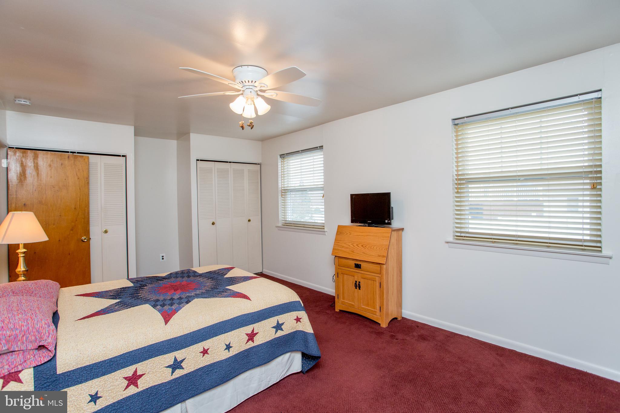 10825 Academy Road Philadelphia, PA 19154 - Photo 29 of 56 Two windows in primary bedroom