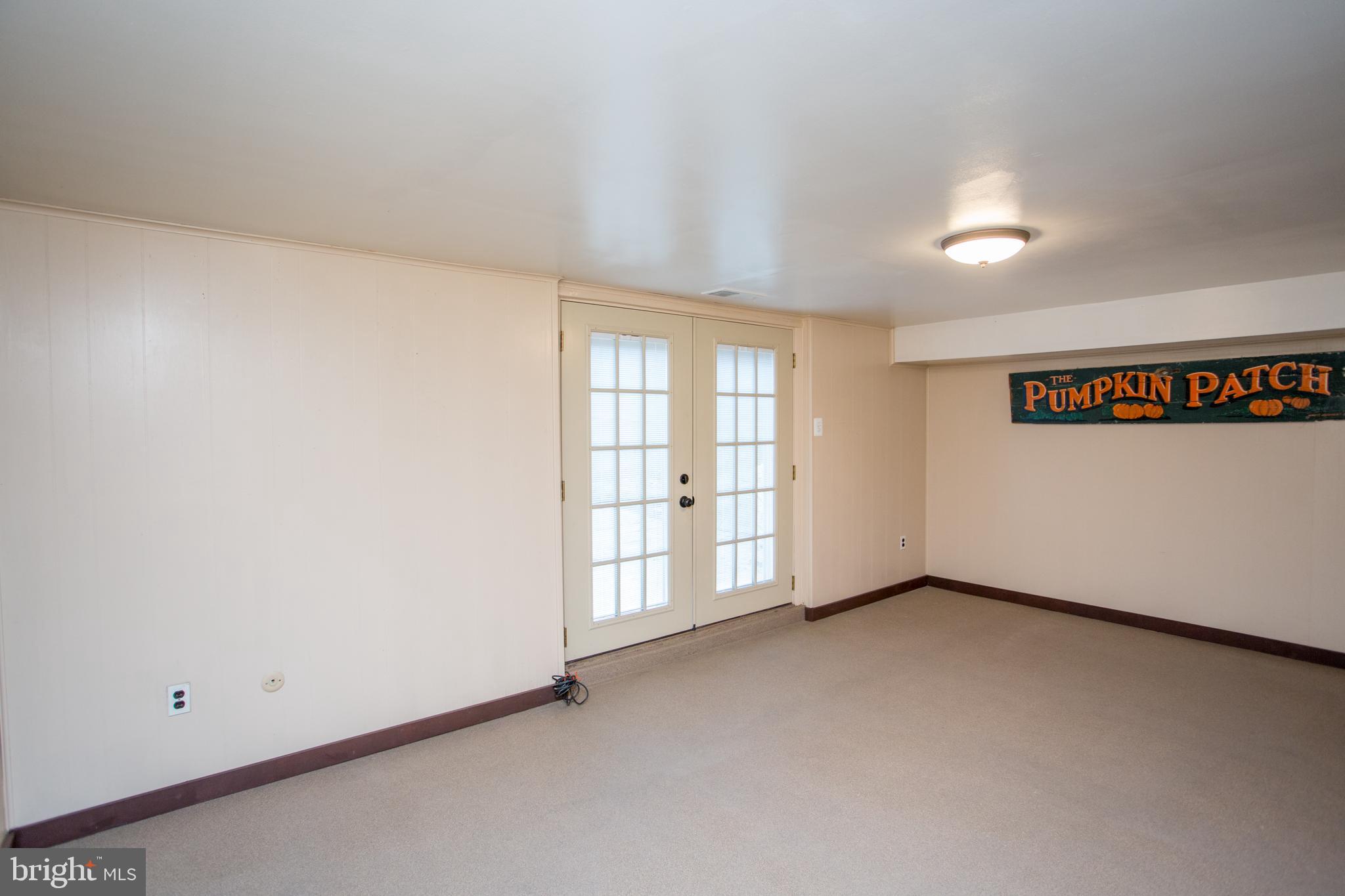 10825 Academy Road Philadelphia, PA 19154 - Photo 41 of 56 Basement showing double doors to yard
