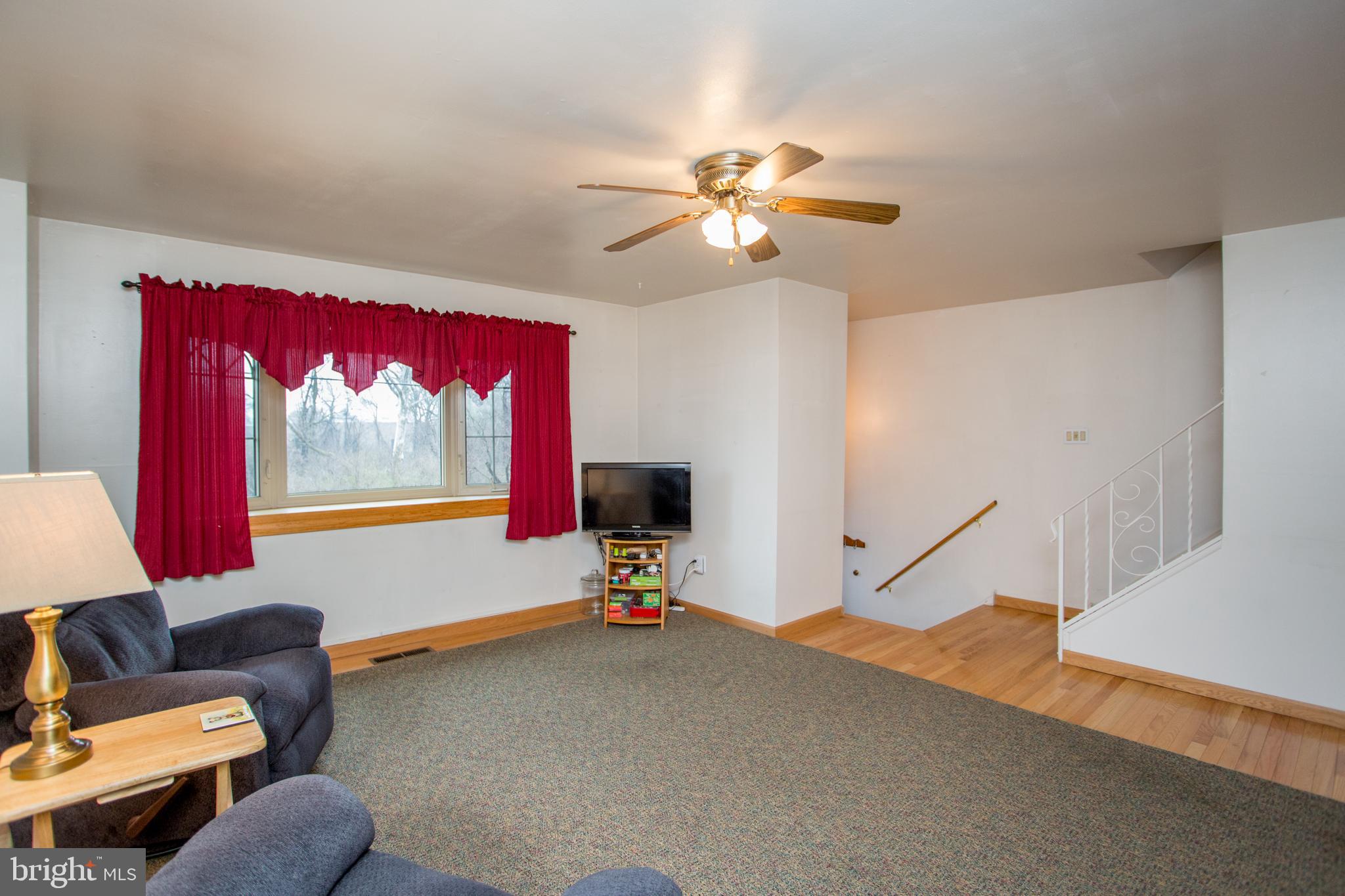 10825 Academy Road Philadelphia, PA 19154 - Photo 7 of 56 Living Room with view of stairs