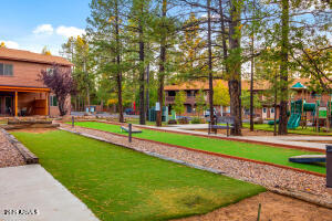 5829 East Buck Springs Road, Unit 252 Pinetop, AZ 85935 - Photo 14 of 27 a garden view with a fountain