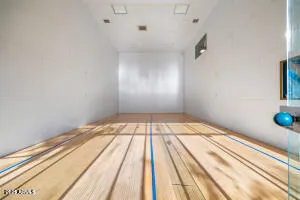 a view of wooden floor in an empty room
