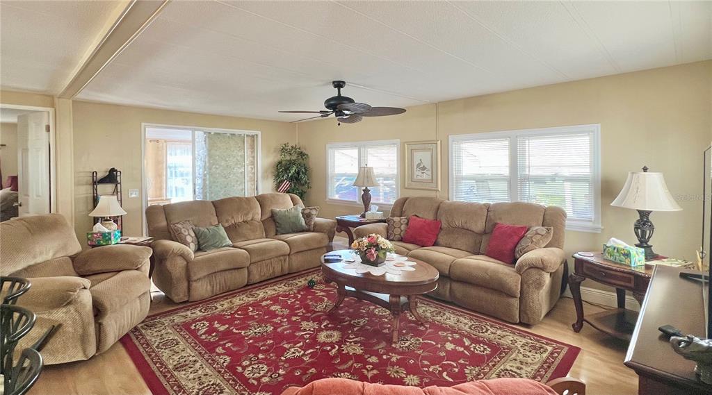 1100 South Belcher Road, Unit 113 Largo, FL 33771 - Photo 30 of 66 a living room with furniture and a rug