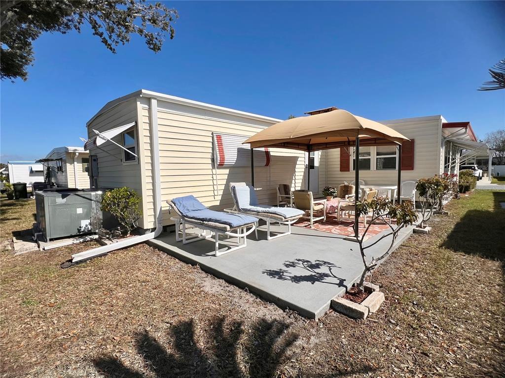 1100 South Belcher Road, Unit 113 Largo, FL 33771 - Photo 4 of 66 a view of a backyard with sitting area