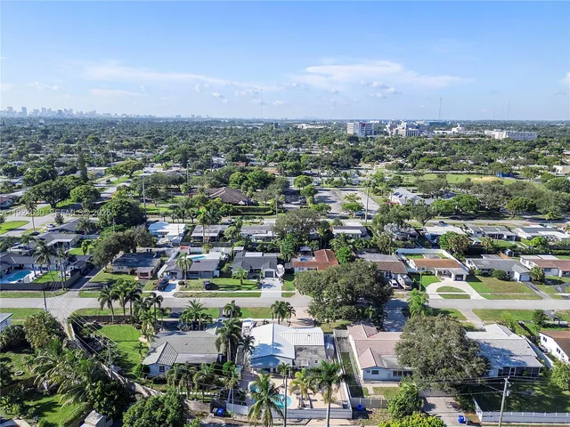 an aerial view of a city with lots of residential buildings