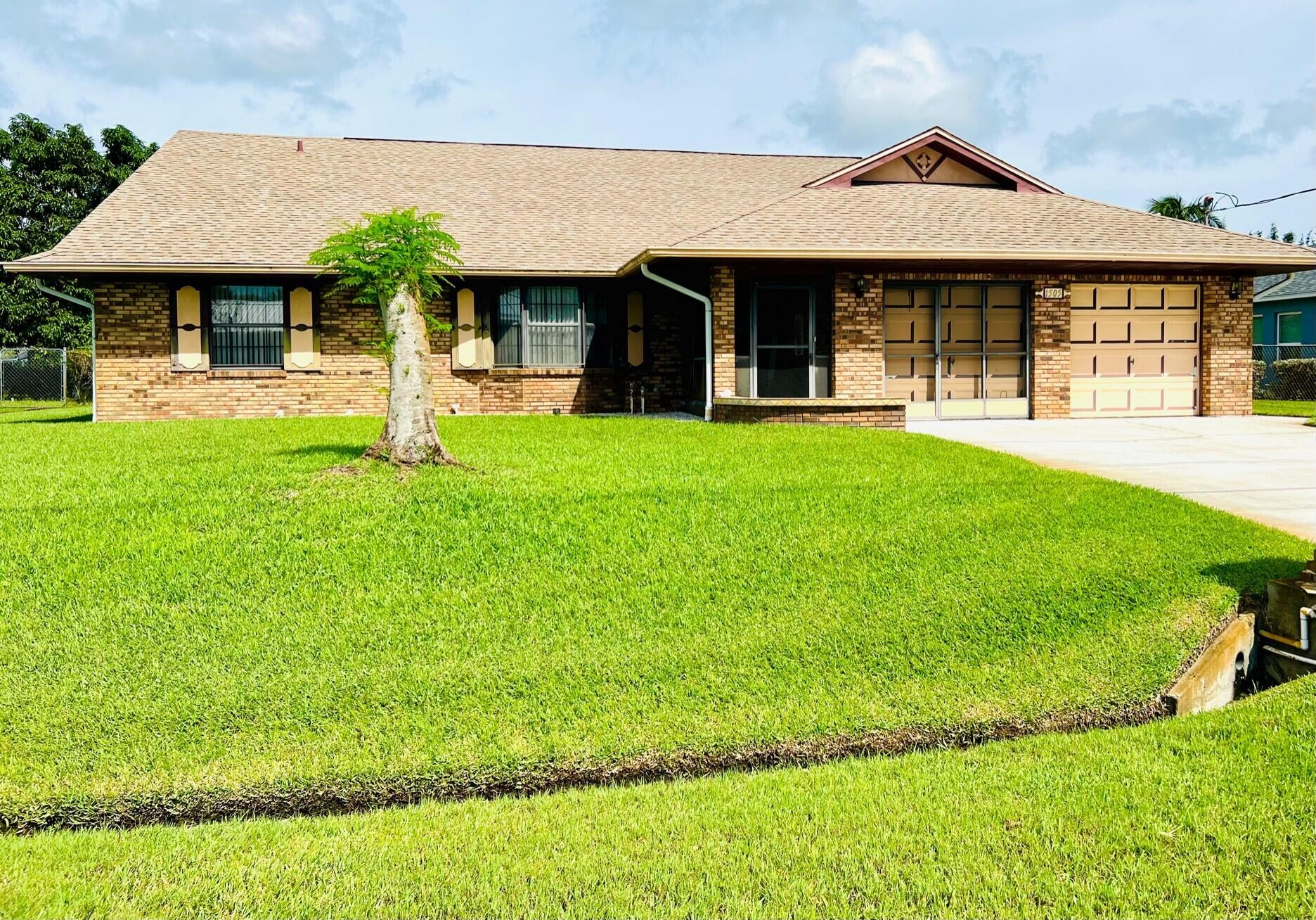 1505 Southeast Pitcher Road Port St. Lucie, FL 34952 - Photo 1 of 17 Front