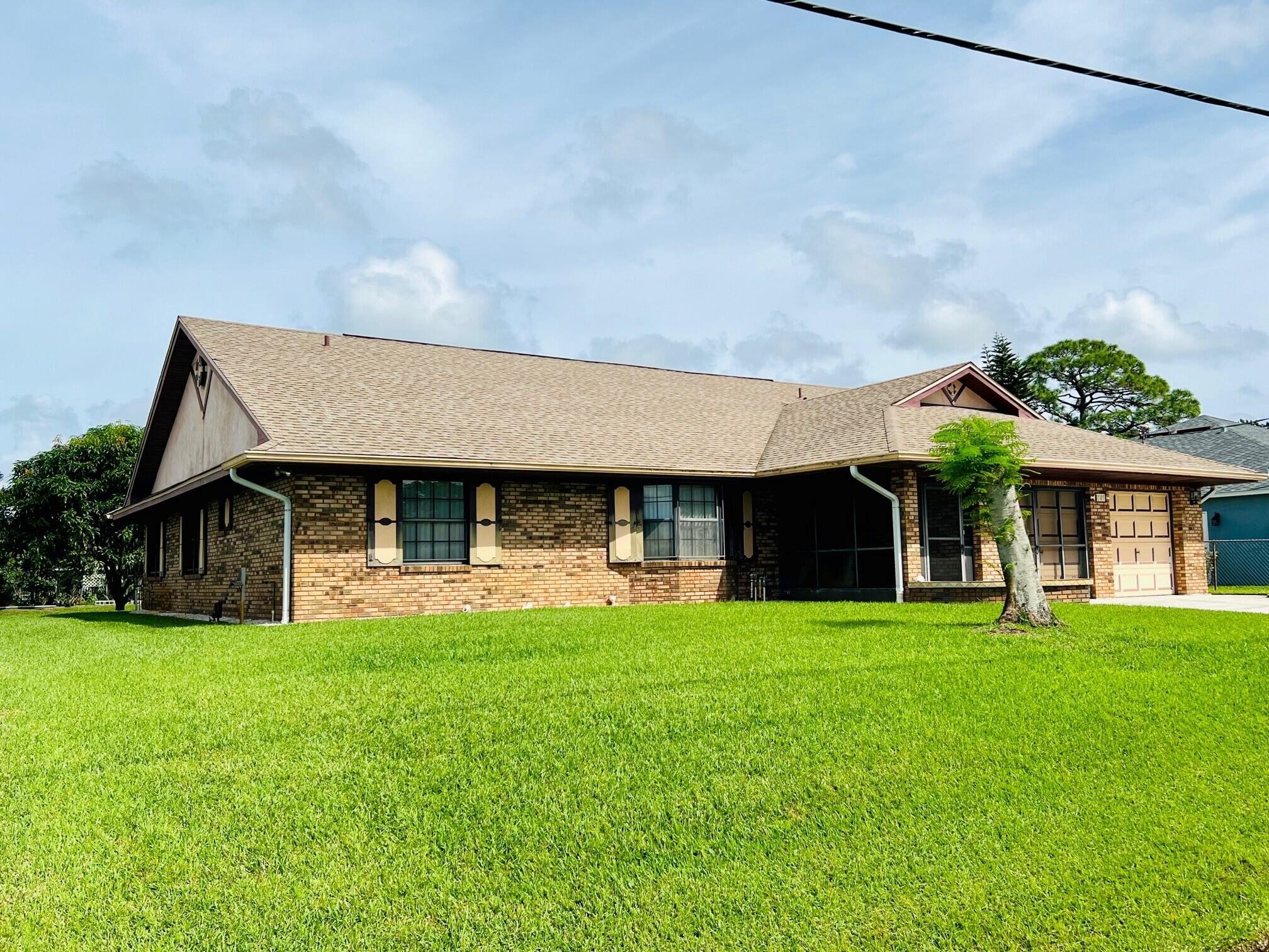 1505 Southeast Pitcher Road Port St. Lucie, FL 34952 - Photo 2 of 17 Front - Left side