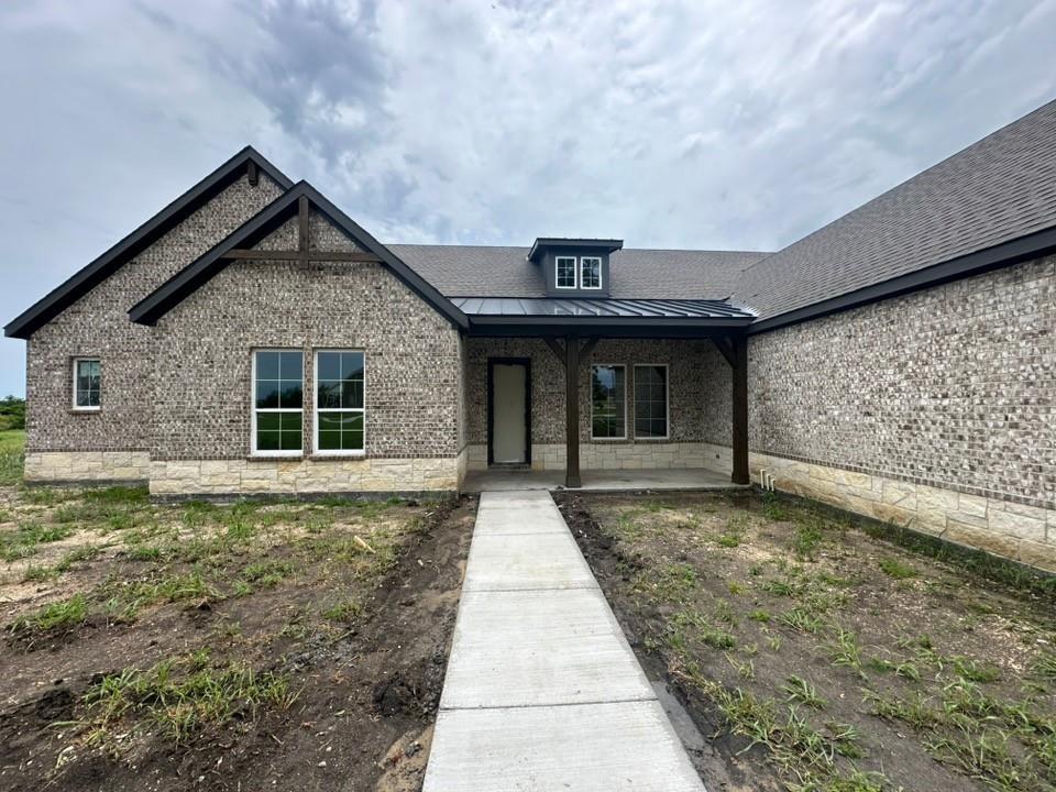 205 Cobb Road Leonard, TX 75452 - Photo 3 of 28 Brick exterior with stone accents and dark trim