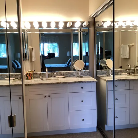 a bedroom with a bed furniture and a window