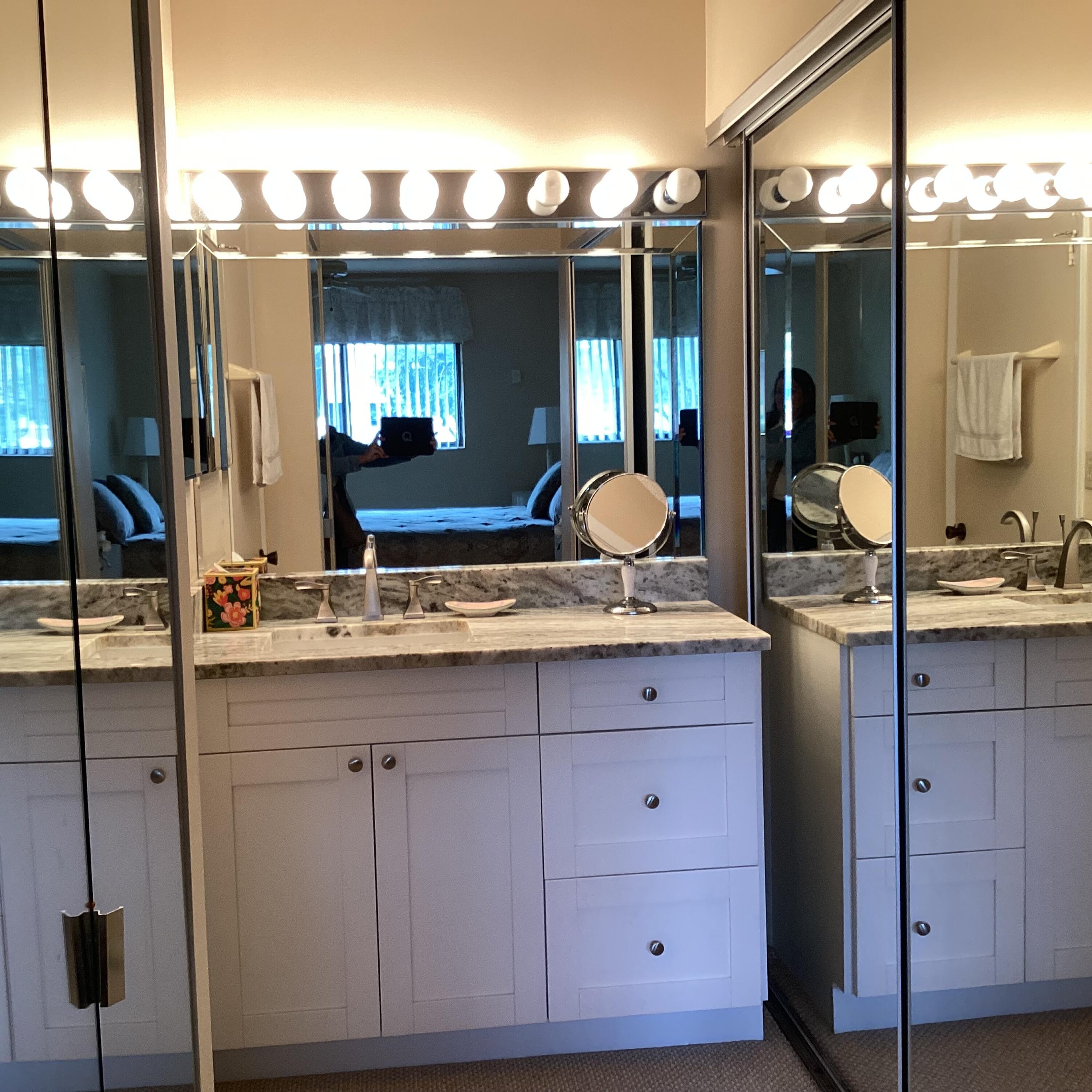 15235 Lakes Of Delray Boulevard, Unit 303 Delray Beach, FL 33484 - Photo 15 of 24 a bathroom with a double vanity sink and mirror