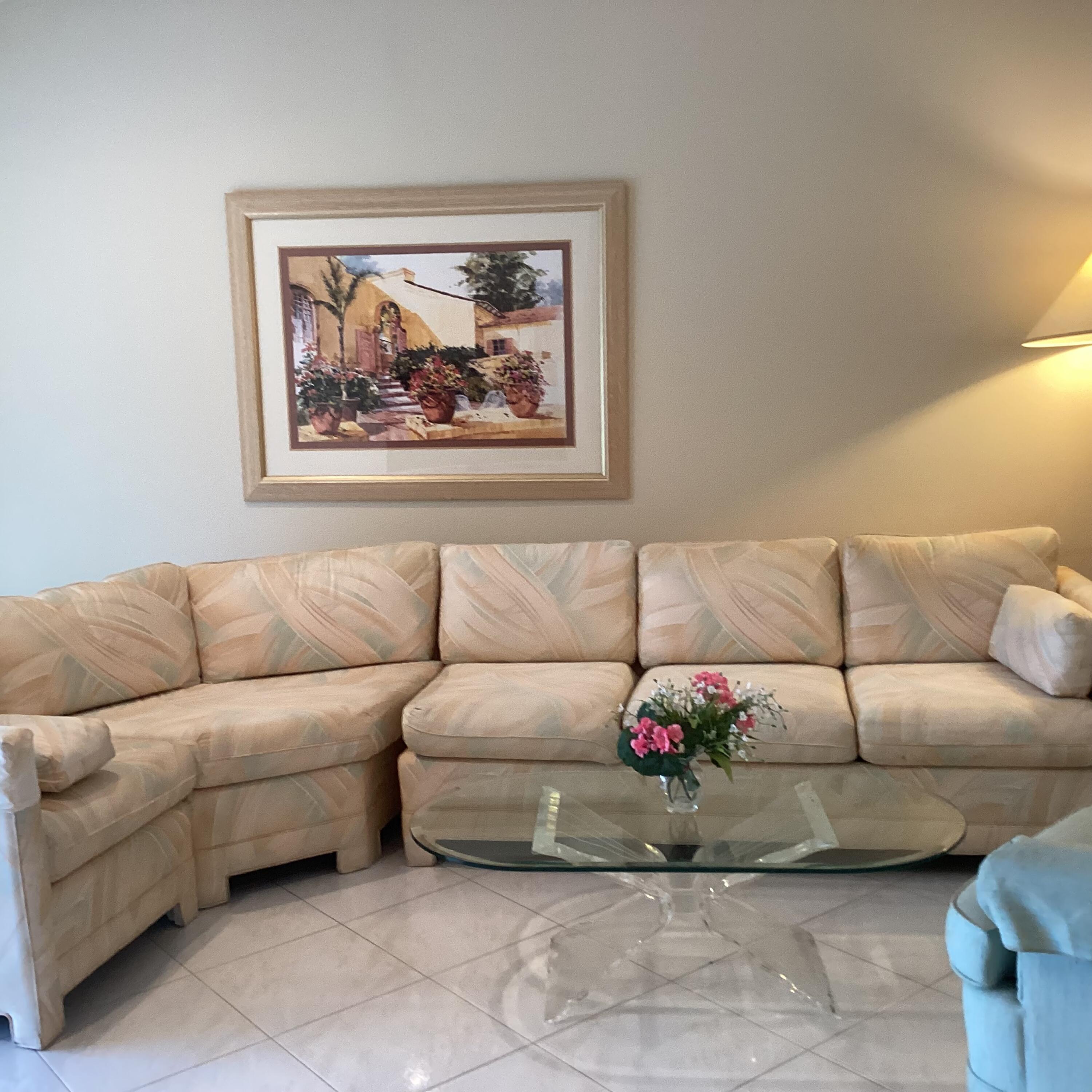 15235 Lakes Of Delray Boulevard, Unit 303 Delray Beach, FL 33484 - Photo 10 of 24 a living room with a couch