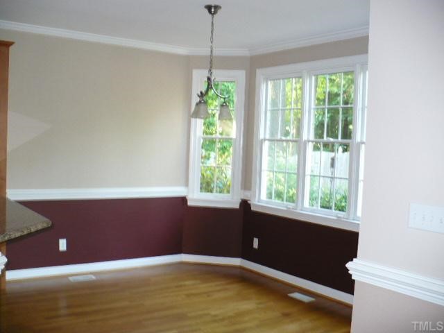 2413 Carruthers Court Raleigh, NC 27615 - Photo 4 of 7 a view of an empty room with a window