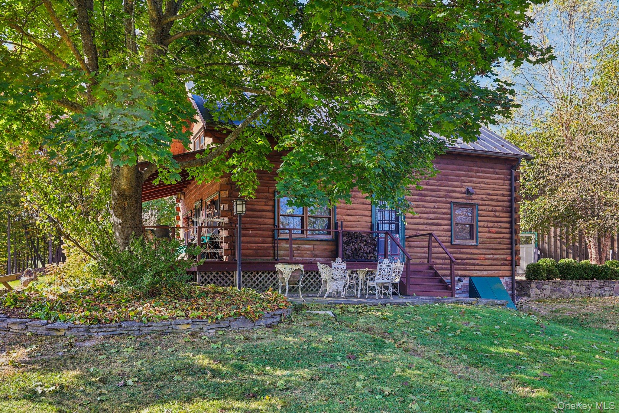 101 Upper Wisner Road Warwick, NY 10990 - Photo 31 of 48 Back of house with a deck, a yard, and log exterior