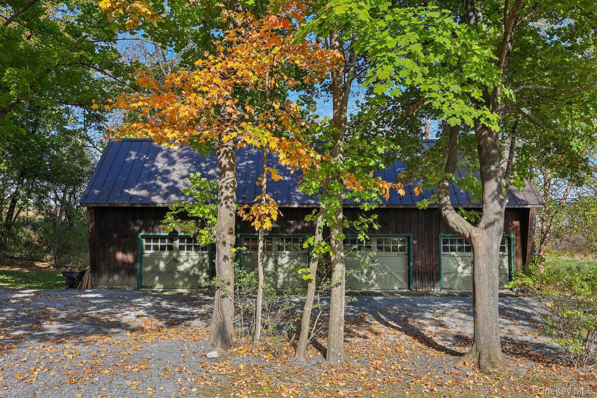 101 Upper Wisner Road Warwick, NY 10990 - Photo 34 of 48 View of home's exterior with a metal roof and a detached garage