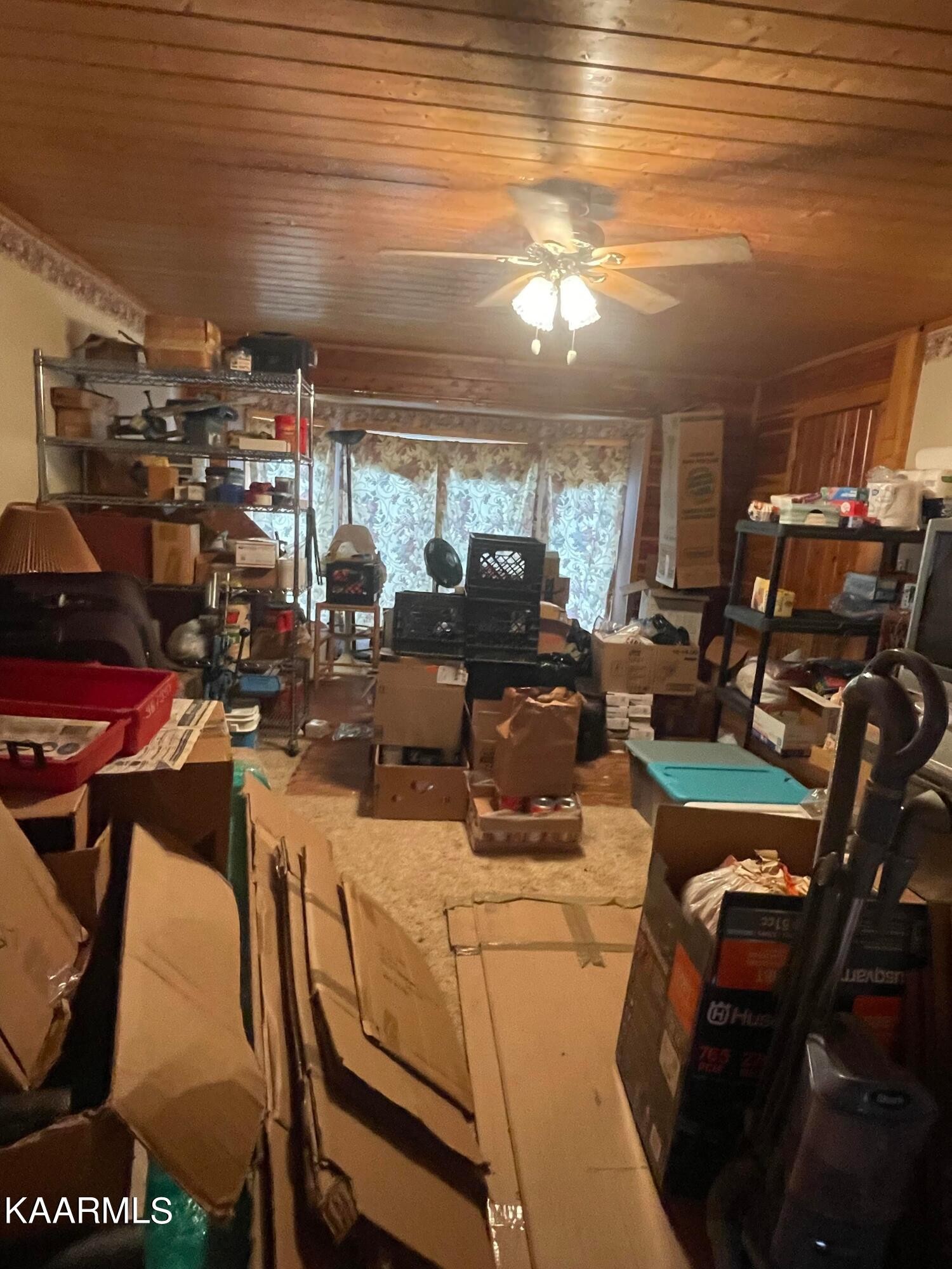 3879 Roan Creek Road Lobelville, TN 37097 - Photo 21 of 45 a view of a room with gym equipment