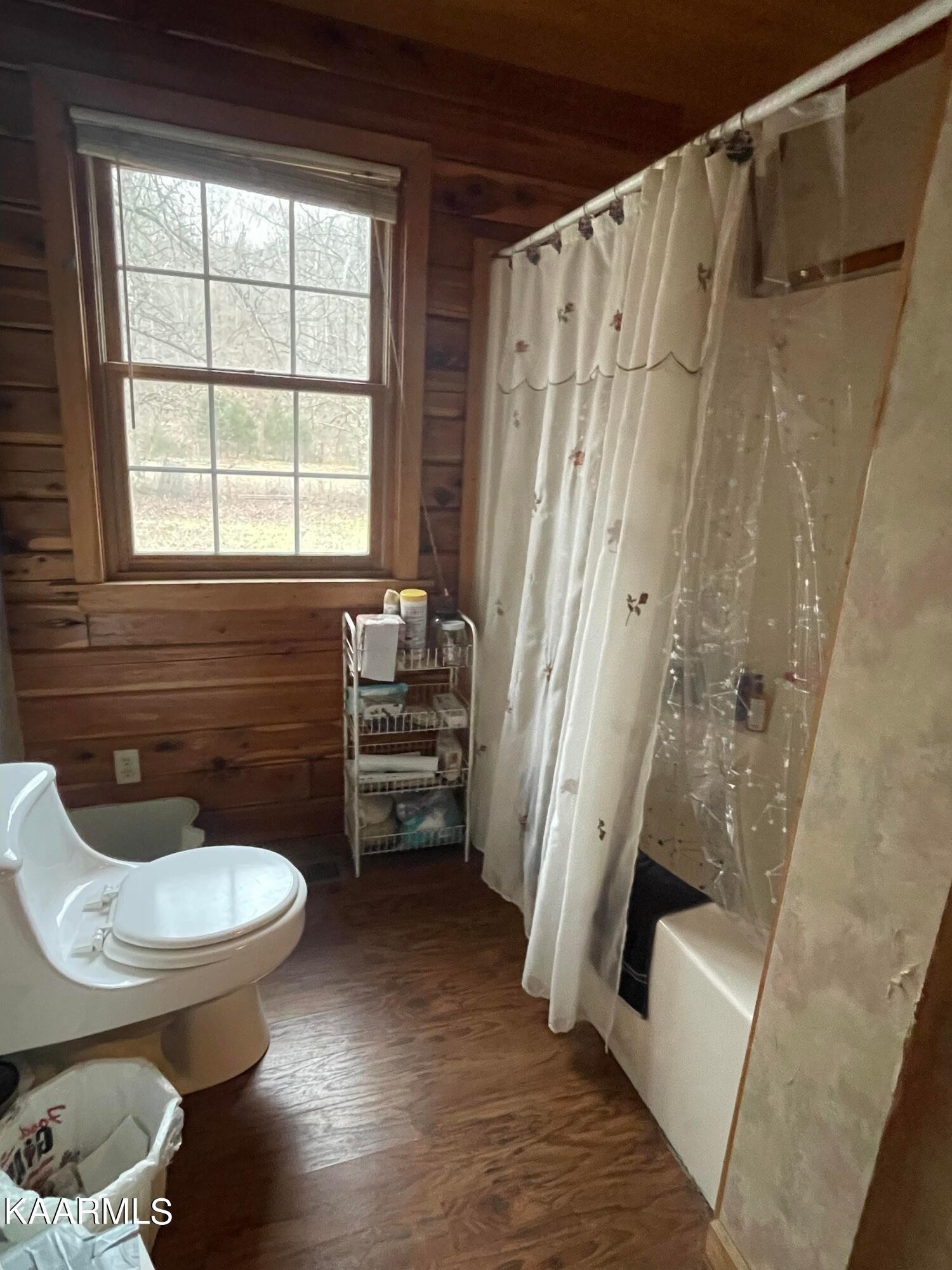 3879 Roan Creek Road Lobelville, TN 37097 - Photo 25 of 45 a bathroom with a sink toilet and shower
