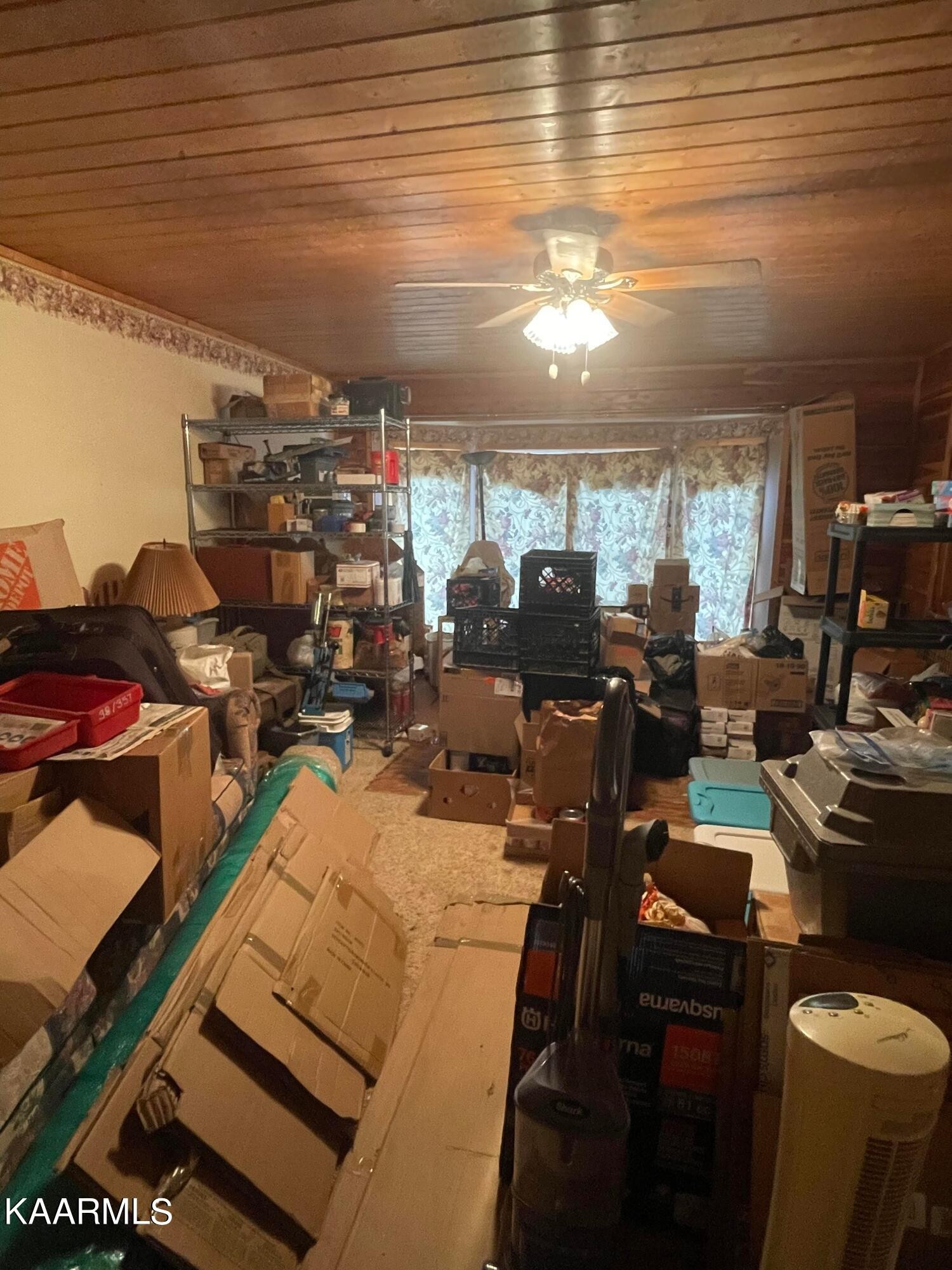 3879 Roan Creek Road Lobelville, TN 37097 - Photo 26 of 45 a view of a room with gym equipment