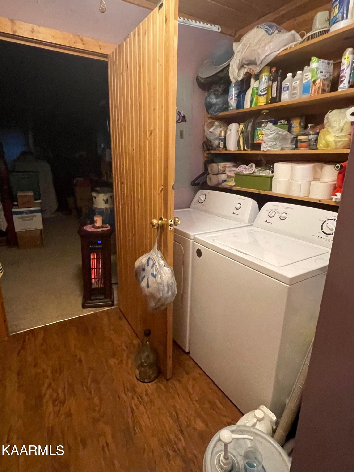 3879 Roan Creek Road Lobelville, TN 37097 - Photo 30 of 45 a room with storage and utility